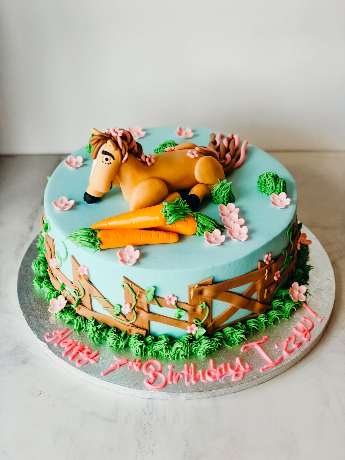 Sculpted 3D cake shaped like a horse