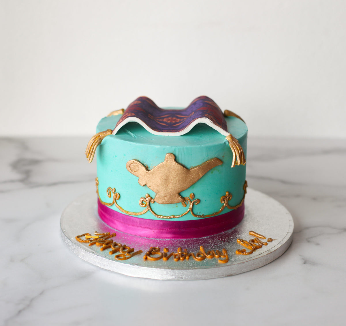 Custom cake decorated with an Aladdin theme