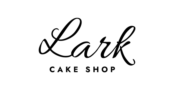 A black stylized script logo reading 'Lark' above the words 'CAKE SHOP' in a clean sans-serif font, centered on a plain white background.