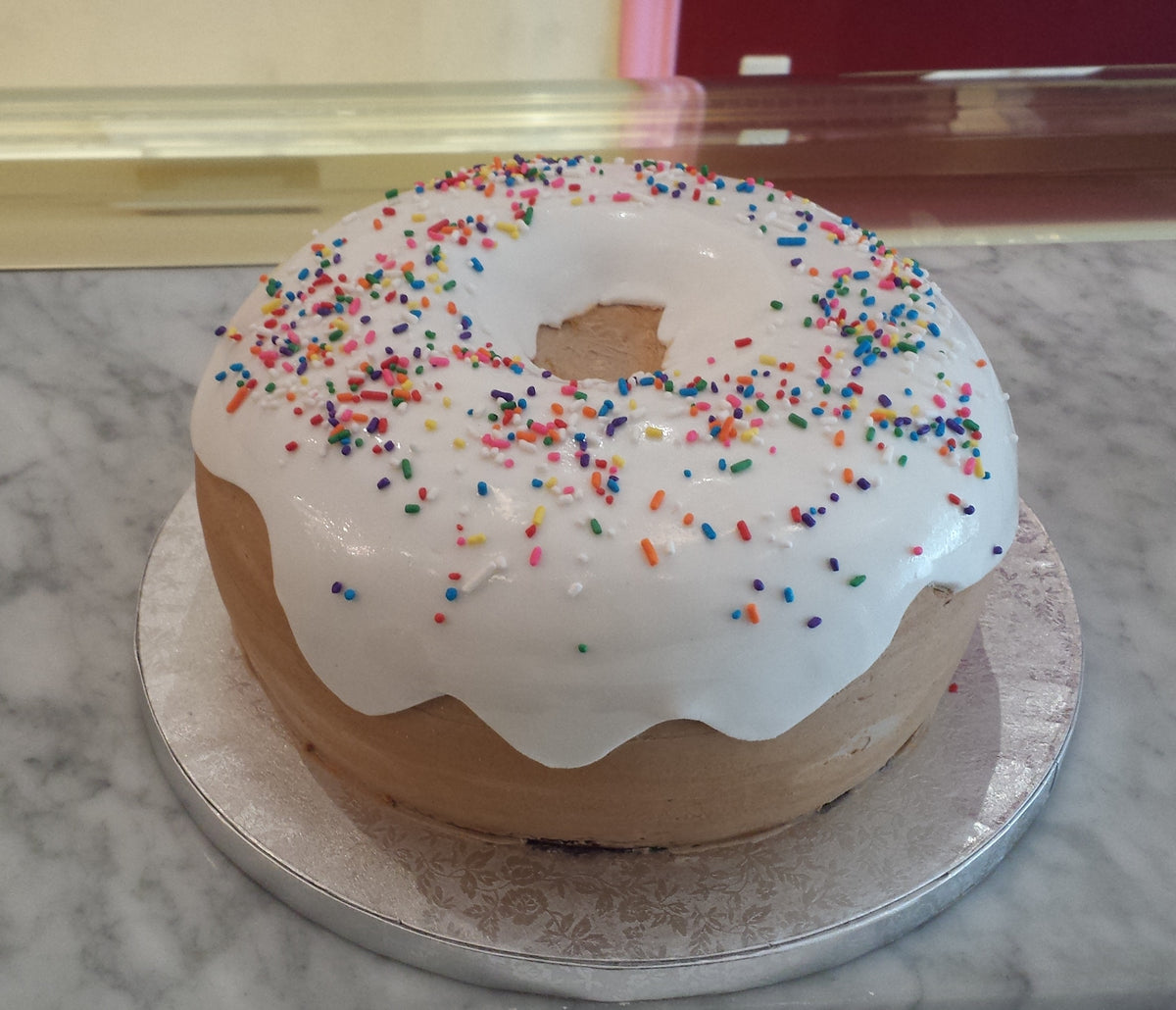Cake decorated to look like a giant donut
