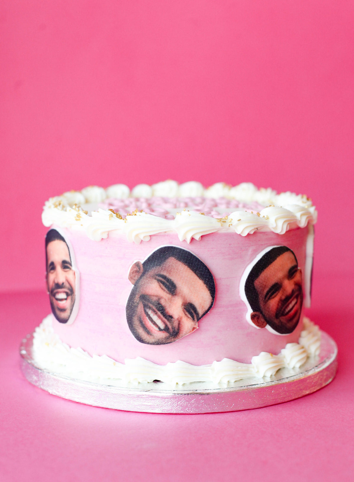 Custom birthday cake featuring a fondant likeness inspired by the artist Drake