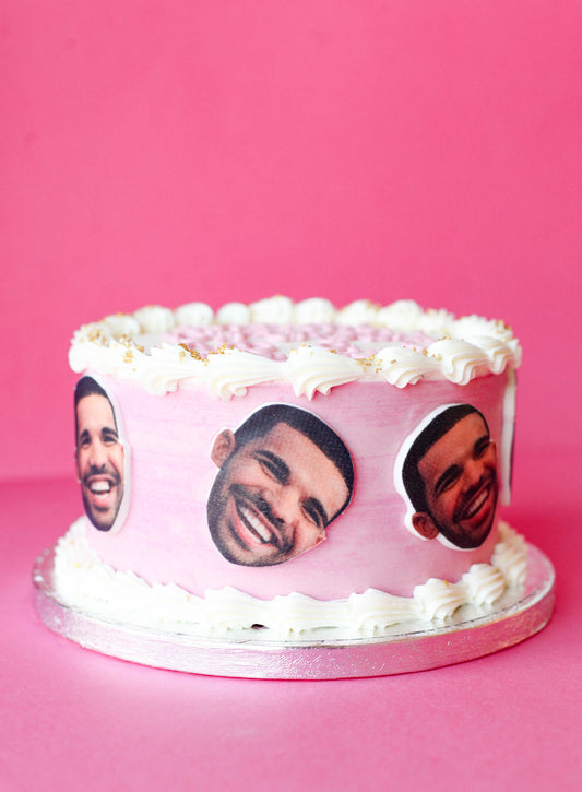 Custom birthday cake featuring a fondant likeness inspired by the artist Drake