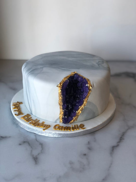 Cake decorated to look like a sparkling geode crystal