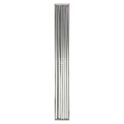 A pack of long, thin metallic silver rods or wires, neatly aligned inside a clear plastic sleeve, shown against a plain white background.
