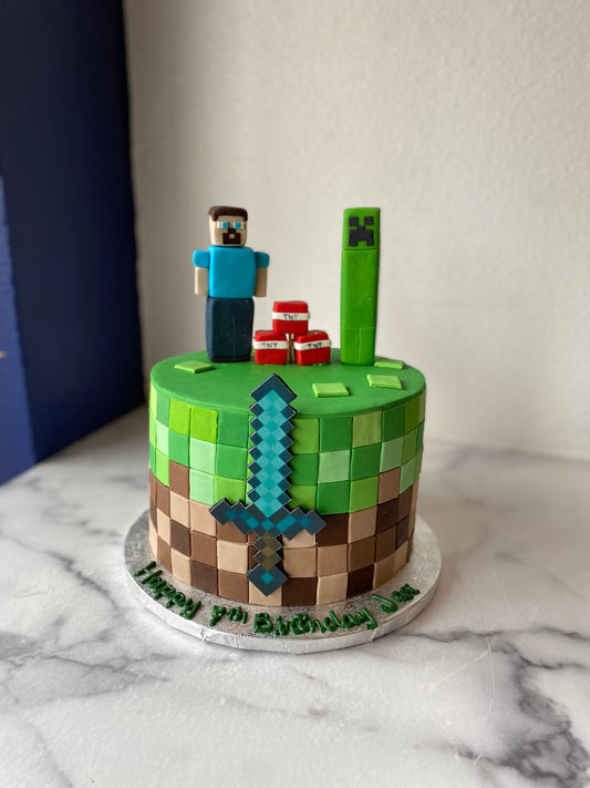Minecraft-themed birthday cake with blocky, pixel-inspired fondant details