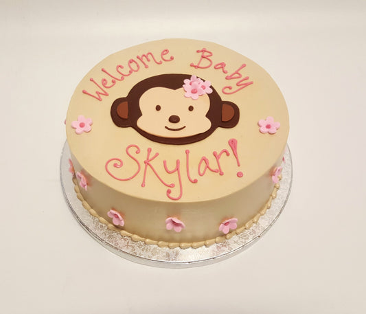 Baby shower cake decorated with a monkey design