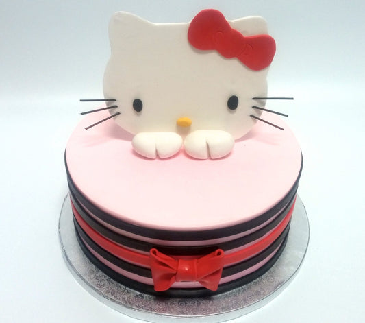 3D Hello Kitty birthday cake with a sculpted character topper