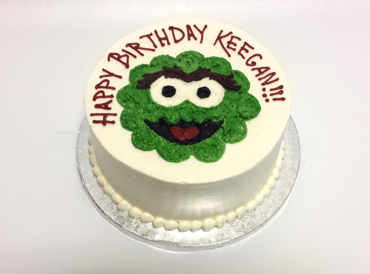 Custom cake decorated with an Oscar the Grouch design