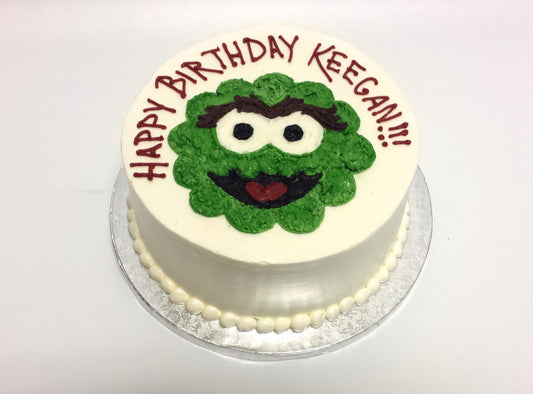 Custom cake decorated with an Oscar the Grouch design