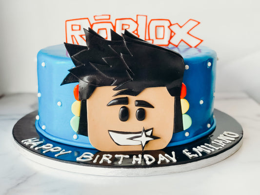 Roblox-themed birthday cake with game-inspired fondant character details