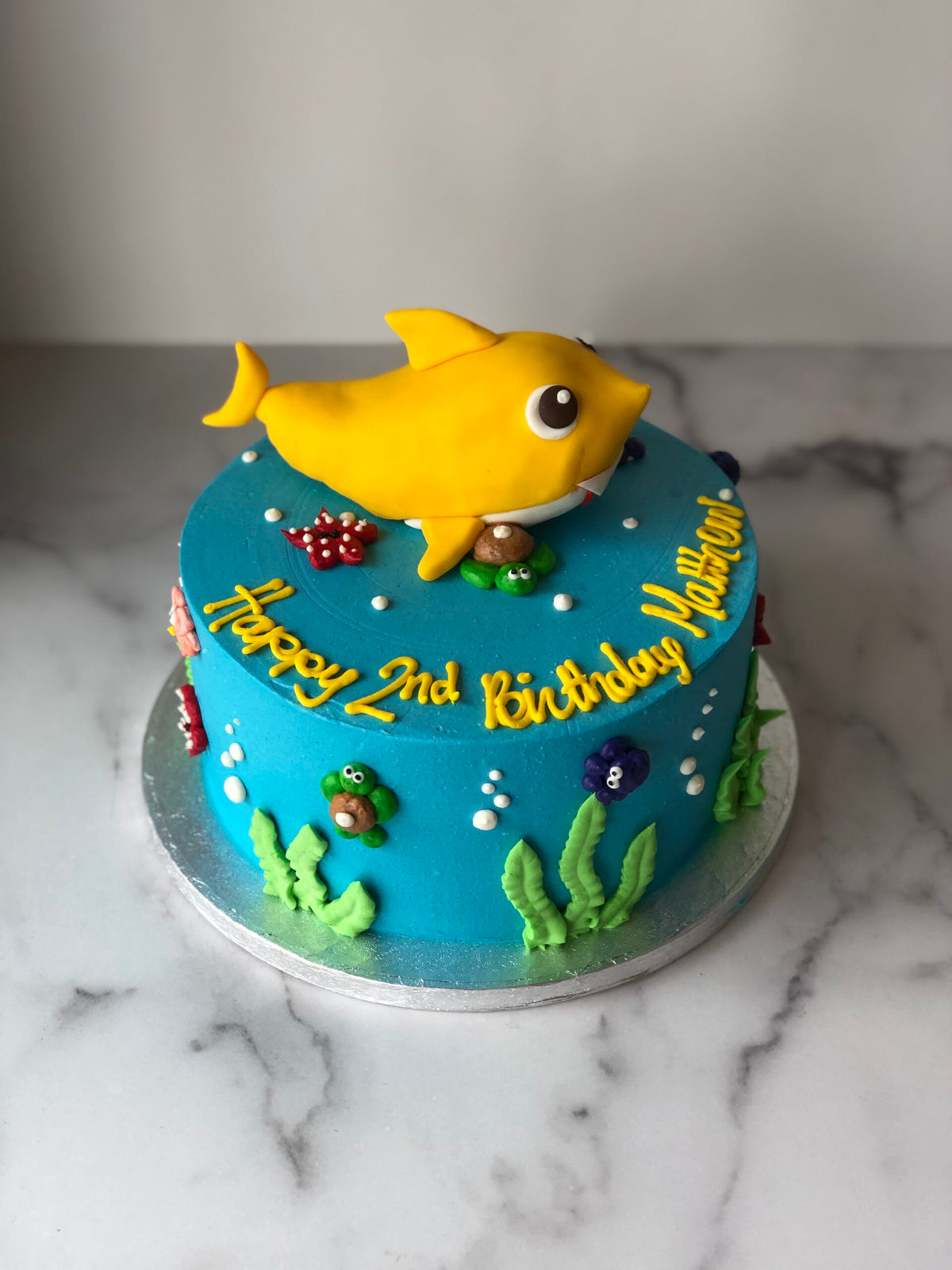 Custom cake decorated with a shark design