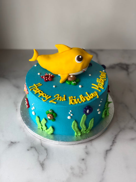 Custom cake decorated with a shark design