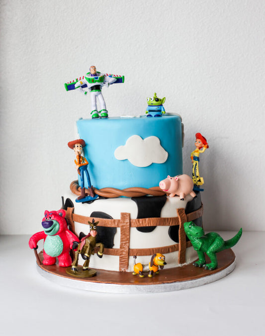 Toy Story birthday cake featuring Woody and Buzz Lightyear fondant details