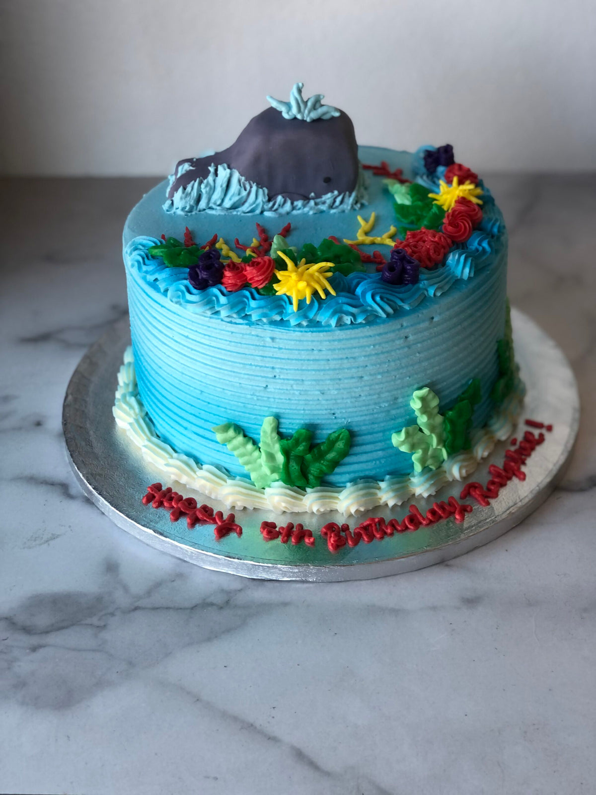 Custom cake decorated with a whale design