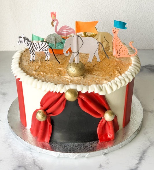 Cake decorated with a circus animals theme