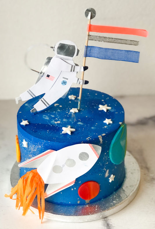 Custom cake decorated with an outer space theme
